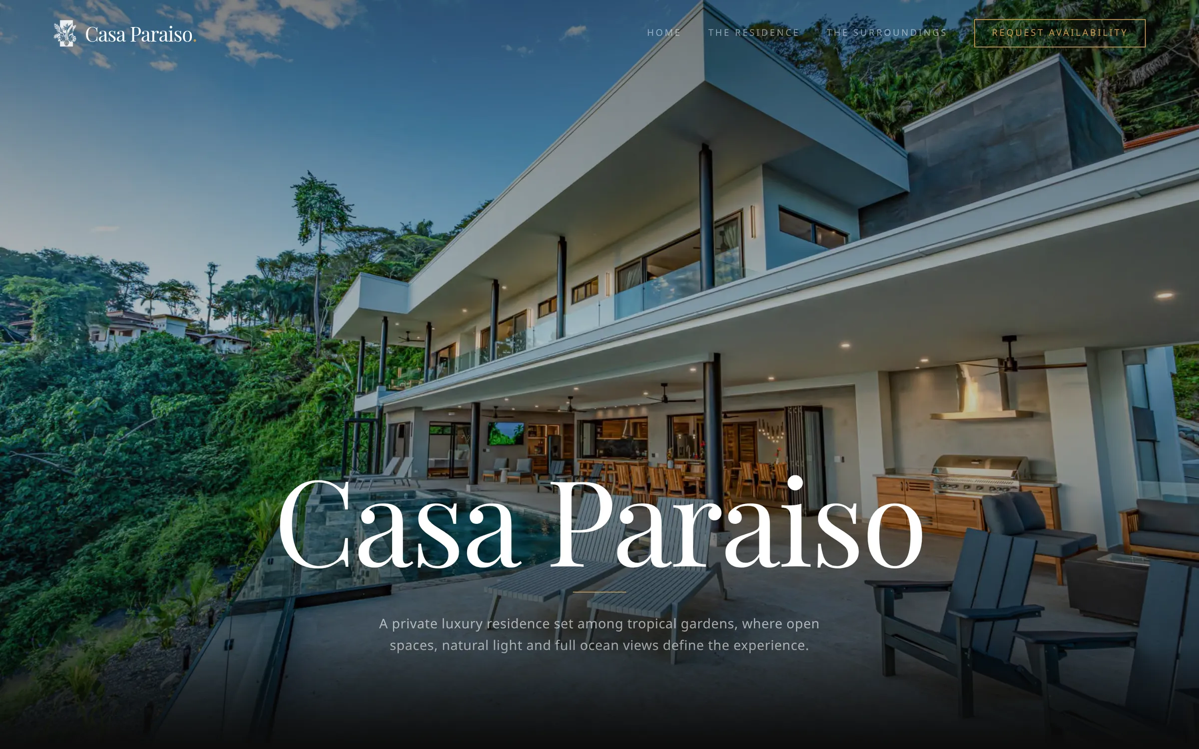 Home page of the Casa Paraiso website: the residence at dusk with its pool and terrace, the name in large serif type and the main menu.